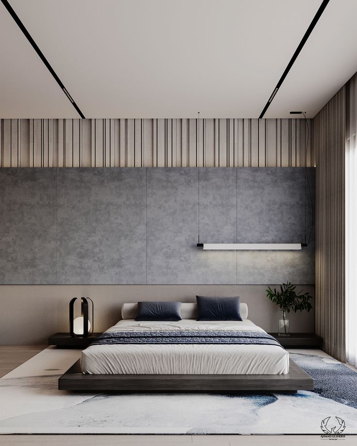 a modern bedroom with concrete walls and flooring is pictured in this image, there are two lamps on either side of the bed