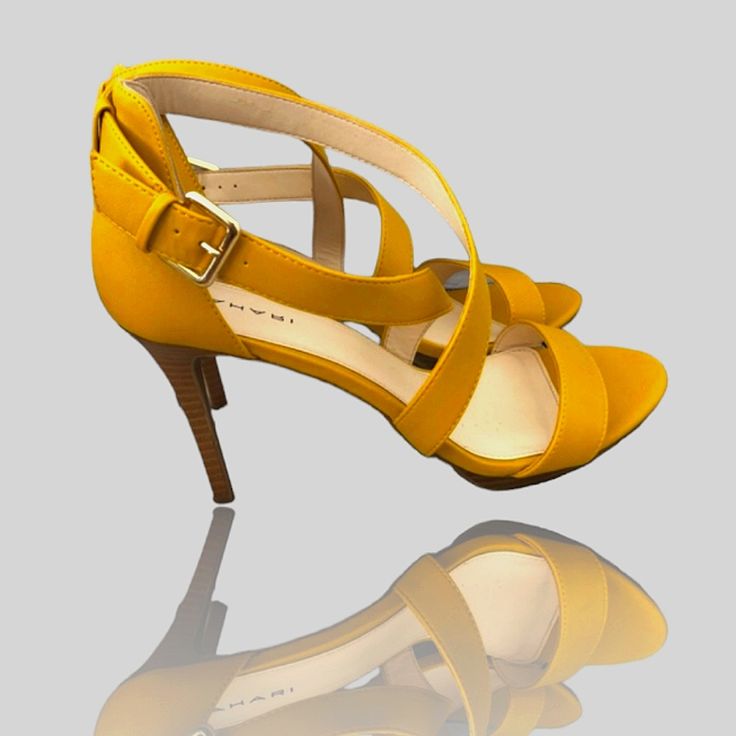 Luxury Women’s Designer Shoes “Tahari” Luxe Mustard Heel Sandal “Tahari” Luxe Mustard/Muted-Yellow Heel Sandals! Versatile Day To Night Wear! Pairs Well With Most Styles! Wears Well For Most Occasions! Easy Elevation To Any Style! Next Level Footwear! Simple Sophistication! Luxe Designer Heel Sandal Simple Sexy Multi Strapped Instantly Elevates Any Style Side Bucket Closure Versatile Day To Night Wear 4” Heel Height Pairs Well W/Most Styles Next Level Status Footwear Excellent New Condition Smok Yellow Sandals With Heel Strap For Evening, Yellow Evening Sandals With Heel Strap, Yellow Sandals With Heel And Ankle Strap, Yellow Open Toe Sandals With Heel Strap, Yellow Sandals For Formal Spring Events, Yellow Open Toe Heels With 4-inch Heel, Yellow Formal Sandals For Spring, Yellow High Heel Sandals With Heel Strap, Yellow Sandals With 4-inch Heel For Spring