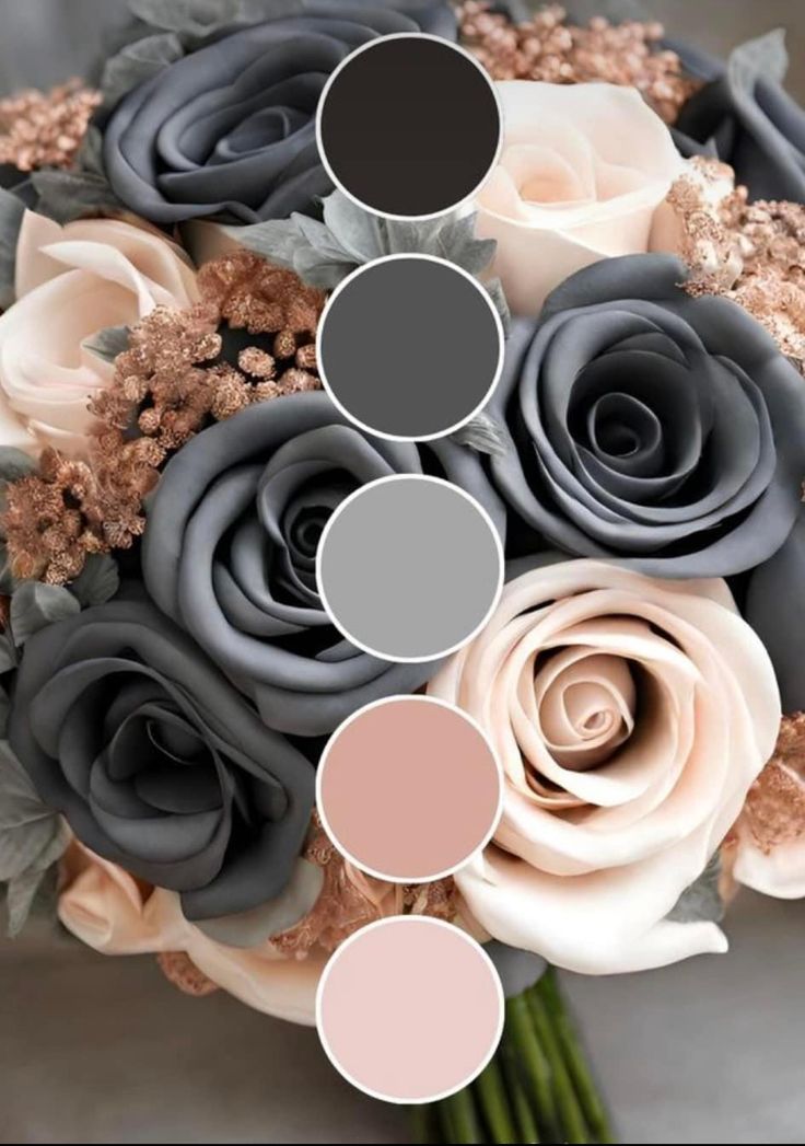 a wedding bouquet with grey and pink flowers