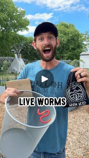 a man is holding a bucket with worms in it and the words live worms written on it