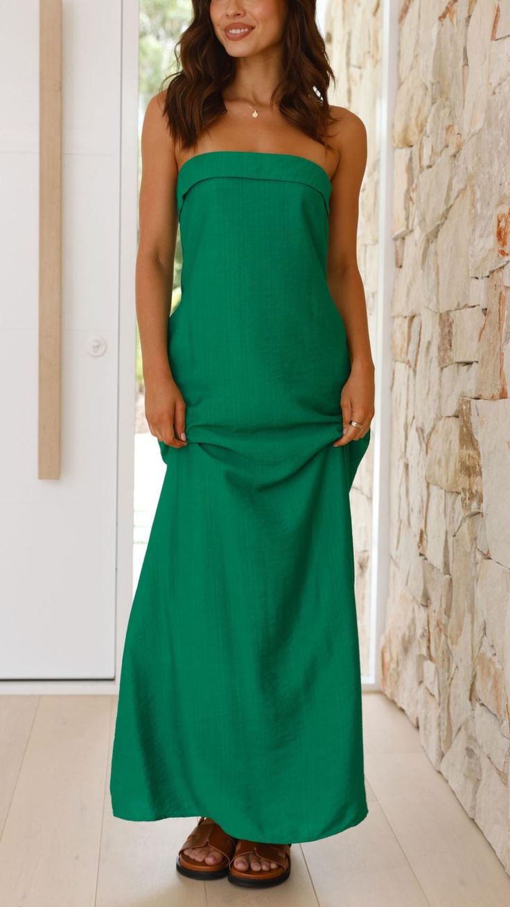 Feel effortlessly chic in this pocketed maxi dress with a relaxed fit. Featuring a strapless design, a bustline fold, and an invisible back zipper for a sleek silhouette. Casual Beach Dress With Back Zipper, Solid Maxi Dress With Pockets For Day Out, Solid Color Maxi Dress With Pockets For Day Out, Casual Maxi Dress With Straight Neckline For Vacation, Chic Maxi Dress With Pockets For Vacation, Chic Vacation Maxi Dress With Pockets, Casual Maxi Sundress With Pockets, Casual Maxi Dress With Straight Neckline, Chic Solid Maxi Dress With Pockets