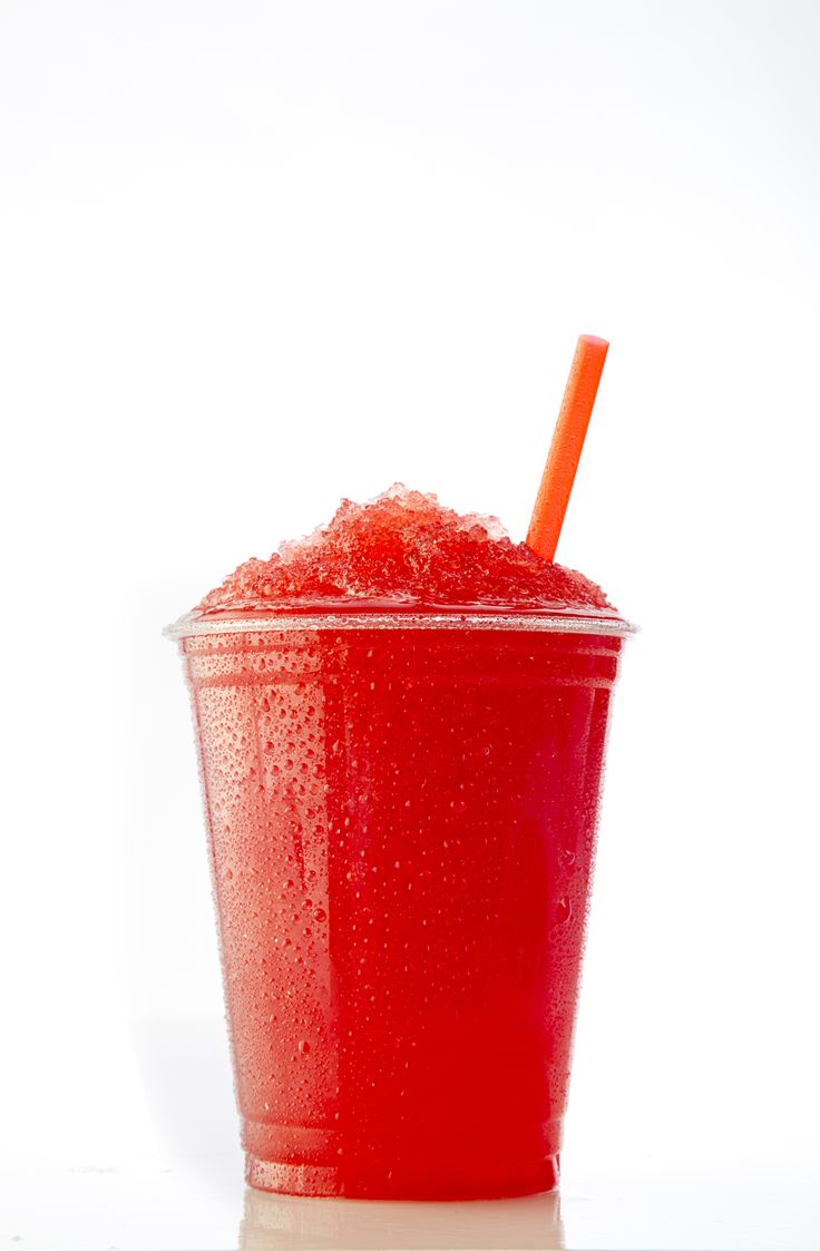 a red drink with a straw in it