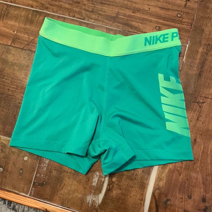 Green Nike Dri-Fit Shorts. Medium. Never Worn. Great Condition. Nike Green Athletic Shorts With Built-in Shorts, Green Stretch Nike Bottoms, Green Sports Shorts With Short Inseam, Green Nike Athletic Stretch Shorts, Nike Green Stretch Athletic Shorts, Nike Green Athletic Shorts With Built-in Liner, Nike Green Activewear Short Length, Nike Green Short Bottoms, Nike Green Short Length Bottoms