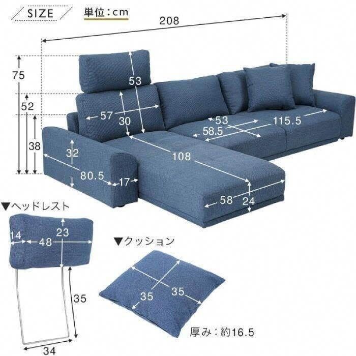 a blue sectional sofa with pillows and measurements