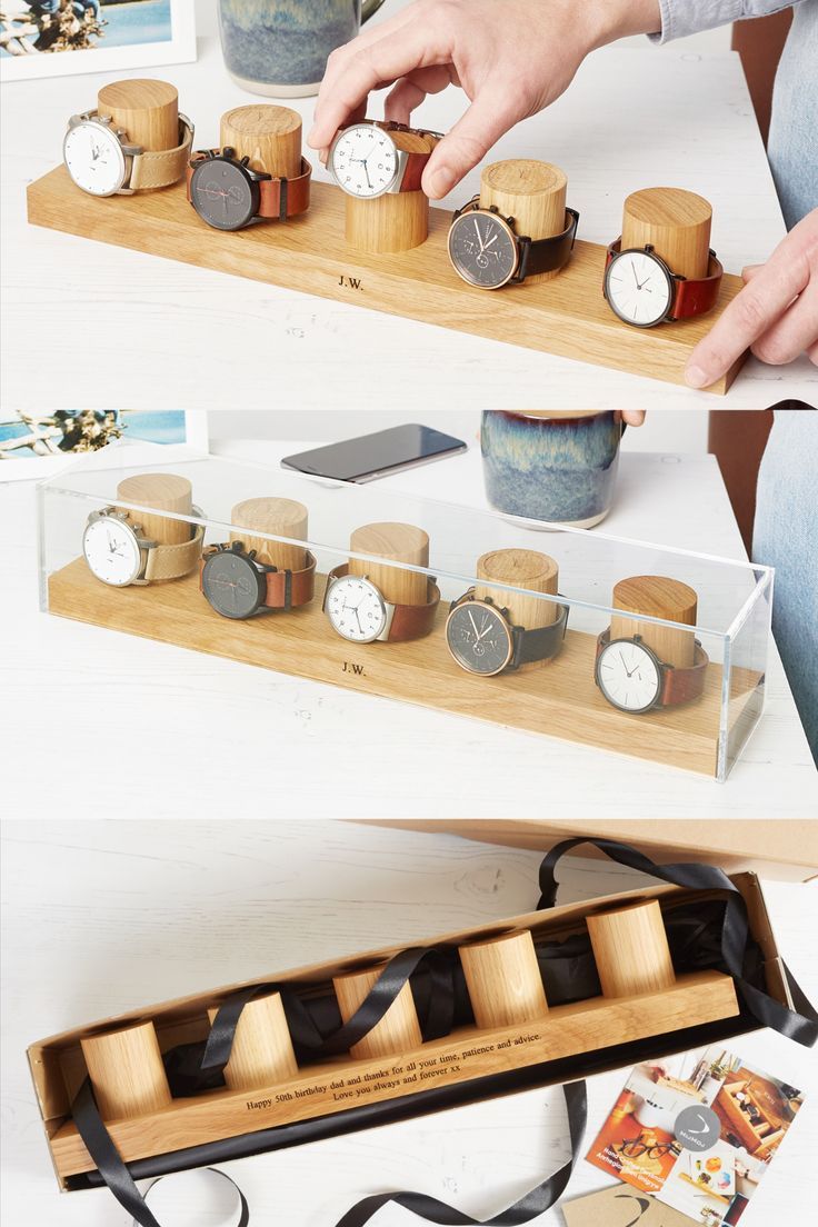 several different types of wooden watches on display with ribbons around the edges and below them