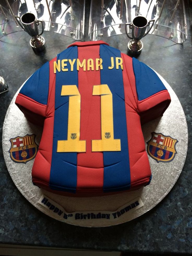 a cake that is shaped like a soccer jersey