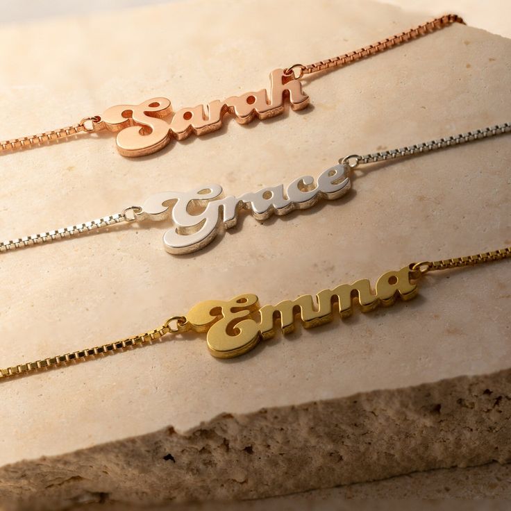 Our Name Necklace in our newest groovy bubble font is the ultimate custom gift for someone who is just as fun loving as this design. Personalize this nameplate necklace with anything you want from a name to your life mantra and gift yourself a unique jewelry piece you will never want to take off. Material: High Quality Solid 925 Sterling Silver Finish: Sterling Silver ∙ 18K Gold ∙ Rose Gold Dimensions: Depending on your font choice, height sizes range from 3mm to 4mm lowercase Size: The total ne Initial Tag Necklace, Sideways Initial Necklace, Fingerprint Necklace, Vintage Names, Diamond Huggies, Nameplate Necklace, Birthday Gifts For Sister, Name Jewelry, Custom Name Necklace