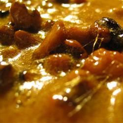 a close up view of some food in a bowl with broth and other things