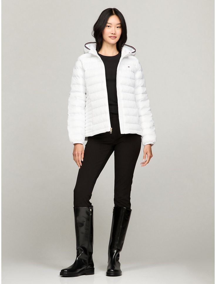 Tommy Hilfiger women's jacket. Be prepared, whatever the weather, with this lightweight puffer jacket, made with a water-resistant finish. A best seller season after season, this outer layer offers a detachable hood, and thermal insulation for optimal protection.  Material: 100% Polyamide. Winter White Down Outerwear, Casual Quilted Jacket With Double-lined Hood, White Fitted Quilted Jacket For Fall, Quilted Jacket With Double-lined Hood For Fall, Casual Down Quilted Jacket, Tommy Hilfiger Fall Outerwear For Cold Weather, White Quilted Jacket For Cold Weather In Fall, White Nylon Puffer Jacket For Fall, Tommy Hilfiger Spring Outdoor Outerwear