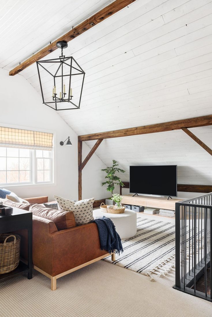 the living room is clean and ready for guests to use it as an entertainment area