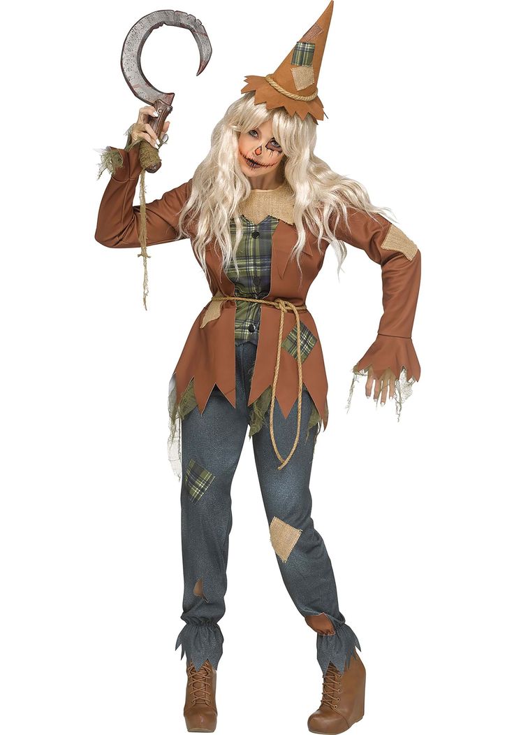 a woman dressed as a scarecrow holding a hammer