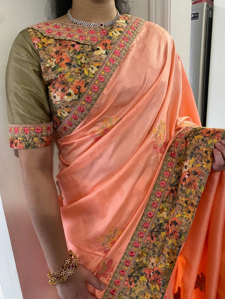 The saree is made of pure silk Georgette, Pallu, and blouse. Colours: Peach, bronze Ready to wear; tussels, fall and pico done Stitched blouse; ready to wear for sizes 32-40. Excellent quality with beautiful colours and combinations. Peach Colour Saree Blouse Combination, Navratri Slub Silk Blouse With Dupatta, Diwali Slub Silk Blouse With Dupatta, Festival Slub Silk Blouse With Dupatta, Bollywood Orange Silk Pre-draped Saree, Designer Wear Orange Pre-draped Saree For Festivals, Orange Pre-draped Saree With Unstitched Blouse, Orange Bollywood Blouse With Dupatta, Bollywood Orange Blouse With Dupatta