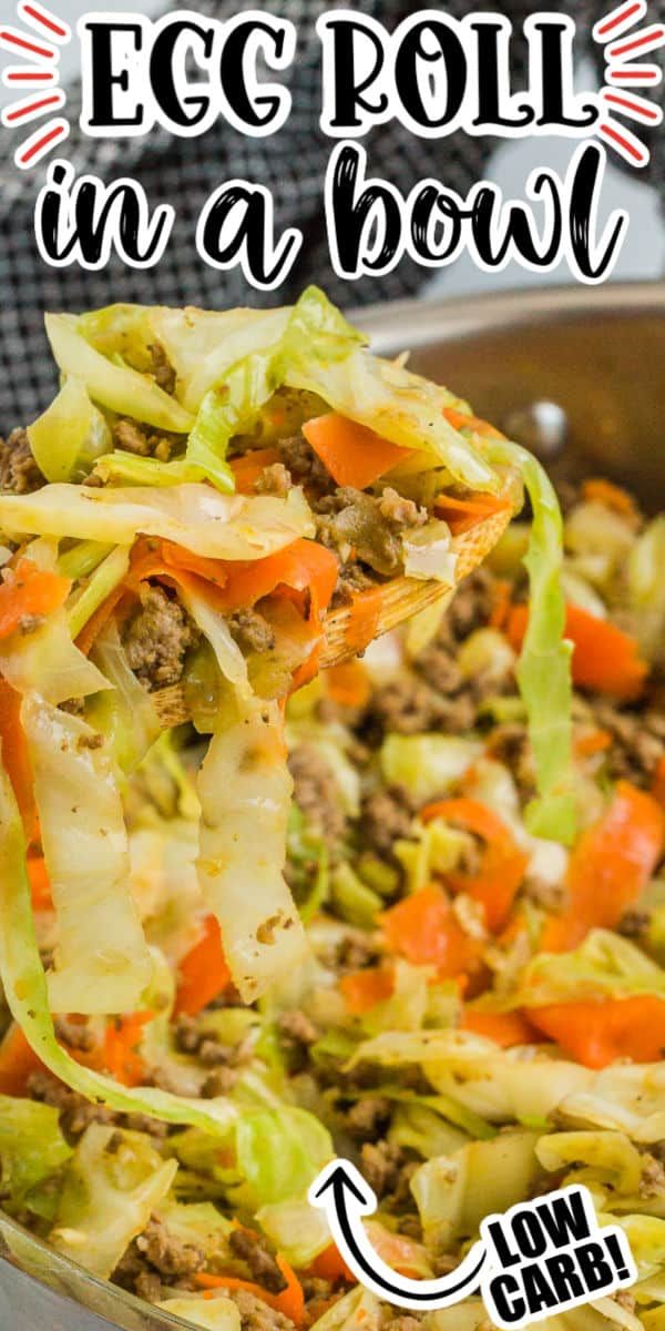 an egg roll in a bowl with carrots and lettuce being lifted from it