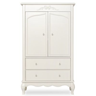 a white armoire with two doors and drawers on the bottom shelf, against a white background