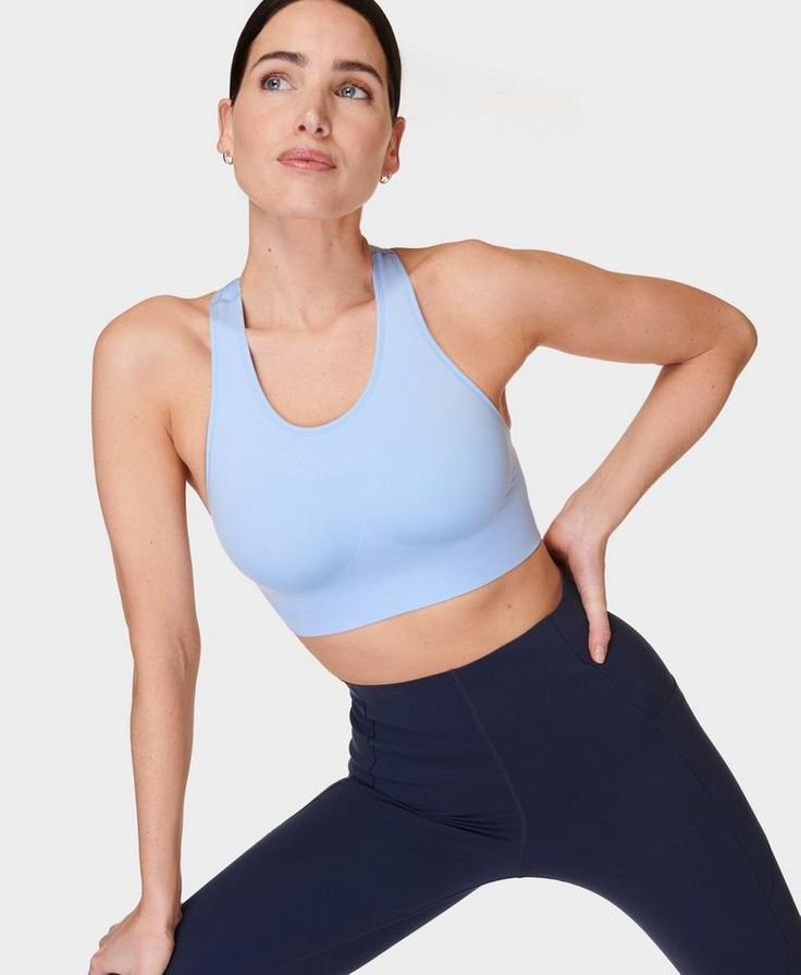 A new and improved version of our bestselling Stamina Sports Bra. Stretchy, sweat-wicking fabric with compression technology. Sleek, cleaner silhouette with a rib contour underband to give support up to a C cup. Zoned rib stitching and seamless design to prevent chafing. Racer back for full freedom of movement. Non-padded sports bra. Model wears size S and is 178cm/5'10" tall. Style Code: SB8758Colour: Breeze Blue Seamless Sports Bra, Padded Sports Bra, C Cup, Running Leggings, Yoga Shop, Sweaty Betty, Women's Sports, New And Improved, Shop Swimwear