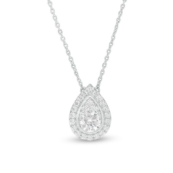 She'll love the sparkle of this splendid diamond necklace. Created in 14K white gold, this glamorous look features a 3/8 ct. diamond in a pear-shaped diamond composite. A frame of intricate milgrain detailing and shimmering diamonds surrounds the center. Radiant with 5/8 ct. t.w. of diamonds and a brilliant buffed luster, this style suspends centered along a 16.0-inch curb chain with 2.0-inch extender that secures with a lobster claw clasp. Pear Shaped Necklace, Pear-shaped Diamond Cut Necklace For Formal Occasions, Timeless Pear-shaped Brilliant Cut Diamond Necklace, Formal Pear-shaped Brilliant Cut Diamond Necklace, Classic Pear-shaped Diamond Drop Necklace, Pear-shaped White Diamond Necklace, Timeless Pear-shaped Diamond Necklace For Anniversary, Classic Pear Shaped Diamond Drop Necklace, Formal Teardrop Diamond White Diamond Necklace