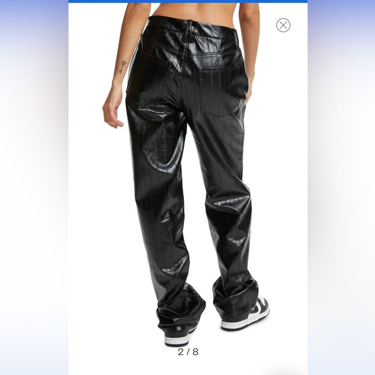 Show Off Retro '90s Style In High-Waisted Pants Cut In A Loose Straight-Leg Silhouette From Textured Faux Leather. Zip Fly With Button Closure Five-Pocket Style 100% Polyurethane Faux Leather Dry Clean Imported Model Stats: 5'10" Height, 32" Bust, 25" Waist, 36" Hip. Model Is Wearing Size 4. Fitted Leather Pants For Streetwear, Fitted Leather Pants For Fall Streetwear, Y2k Style Bottoms For Night Out In Fall, Chic Straight Leg Leather Pants For Streetwear, Fitted Bottoms For Fall Streetwear, High Waist Leather Pants For Spring Streetwear, Chic Streetwear Leather Pants With Straight Leg, Trendy Fitted Leather Pants For Streetwear, Spring Streetwear Wide Leg Leather Pants