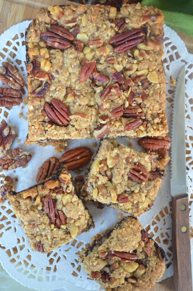 several pieces of granola and nuts on a plate