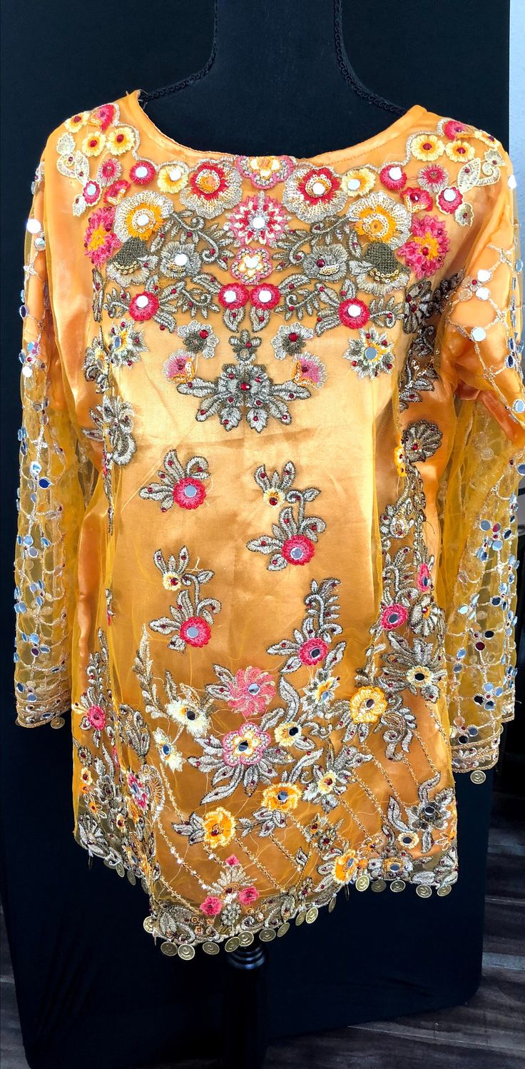 Satin and netted Lengha with embroidery and glass handwork. Full sleeve with lining. Traditional Hand Embellished Salwar Kameez For Diwali, Elegant Embellished Net Sharara, Traditional Hand Embellished Sets For Festivals, Festive Hand Embellished Long Sleeve Salwar Kameez, Festive Long Sleeve Hand Embellished Salwar Kameez, Embellished Gold Traditional Wear With Long Sleeves, Gold Embellished Long Sleeve Traditional Wear, Traditional Hand Embellished Dupatta, Party Salwar Kameez Hand Embellished With Long Sleeves