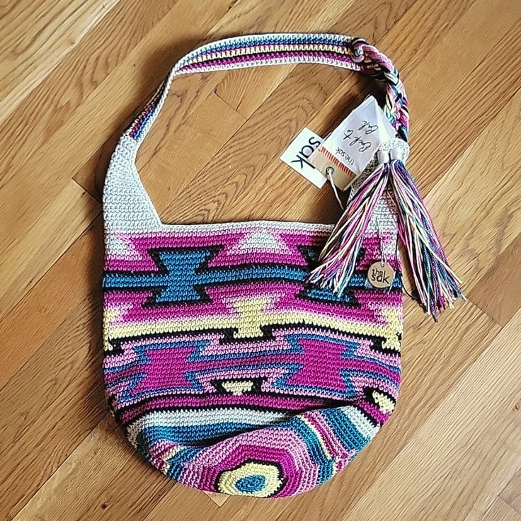 Nwt. Perfect Condition Never Used. Hand Crocheted And Signed By Artist On 12/11/20. Beautiful Colors In Tribal Pattern. Fully Lined. This Is A Very Sturdy Bag. Key Chain Fob Attached And In Wrapper Still. Pink Crochet Bucket Bag With Adjustable Strap, Bohemian Pink Bucket Bag, Pink Bohemian Crochet Bag With Adjustable Strap, Pink Bohemian Crochet Shoulder Bag, Pink Bohemian Crochet Bag For Everyday Use, Pink Bohemian Crochet Bag For Everyday, Pink Tote Hobo Bag For Vacation, Bohemian Pink Bucket Beach Bag, Pink Bohemian Bucket Beach Bag