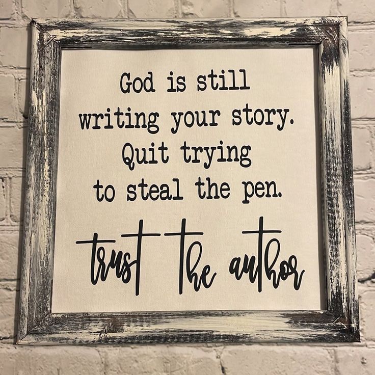 a sign that reads, god is still writing your story quiting to steal the pen trust the author