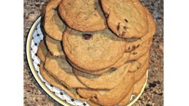 a pile of cookies sitting on top of a plate