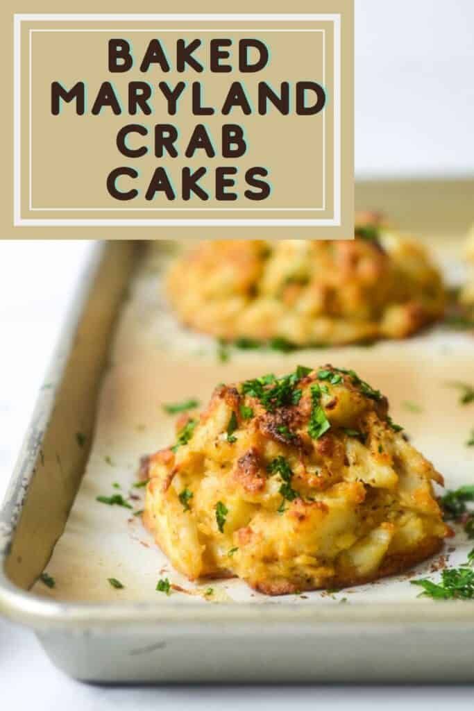 baked maryland crab cakes on a baking sheet with the title overlay reading baked maryland crab cakes