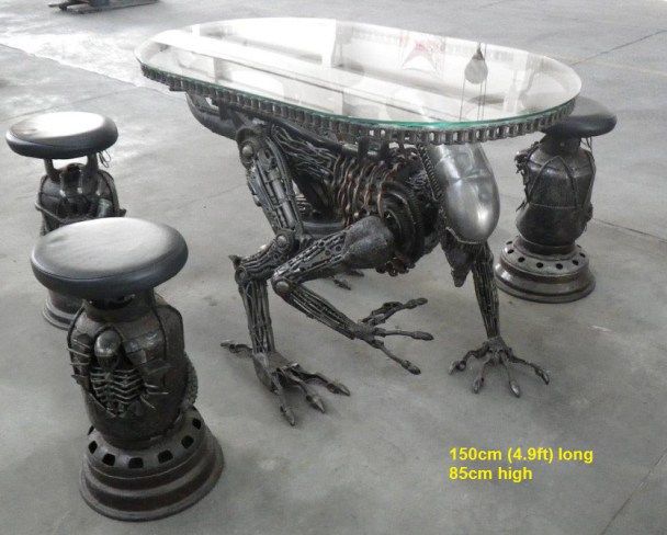 a table that has some kind of weird looking thing on it's legs and legs