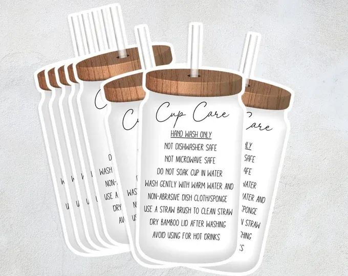 six personalized mason jars with wooden lids and straws on the top one is labeled cup care