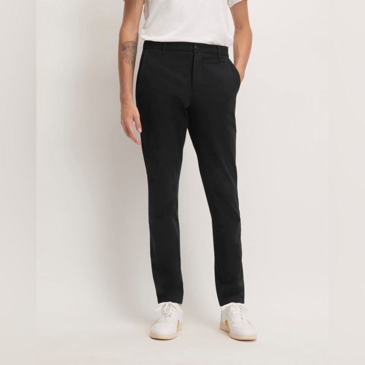 Nwt Everlane The Performance Chino | Uniform In Black. Athletic Fit. Sizes 32x32, 32x30 And 34x32 Available. Performance Chinos: Great In Theory, But Most Are Too Crinkly, Too Tech-Y, And Too Expensive. The Athletic Fit Performance Chino Has Everything We Love About Our Slim Chinosthey’re Sweat-Wicking, Quick-Drying, And Have 4-Way Stretch. The Athletic Fit Offers A Roomier Fit Through The Hip And High Style Than Our Best-Selling Slim Fit. We Recommend It For Those Who Want A Slim Fit With More Black Slim Fit Elastane Pants, Black Slim Fit Straight Leg Chinos, Classic Black Elastane Bottoms, Business Casual Black Chinos With Welt Pockets, Black Tapered Leg Dress Pants In Elastane, Black Tapered Leg Chinos For Business Casual, Black Fitted Cotton Dress Pants, Tailored Black Straight Leg Chinos, Tailored Black Chinos With Welt Pockets