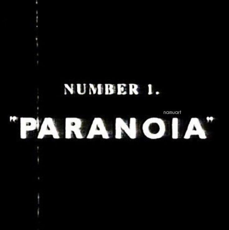 the number 1 paranoia sign is lit up in the dark