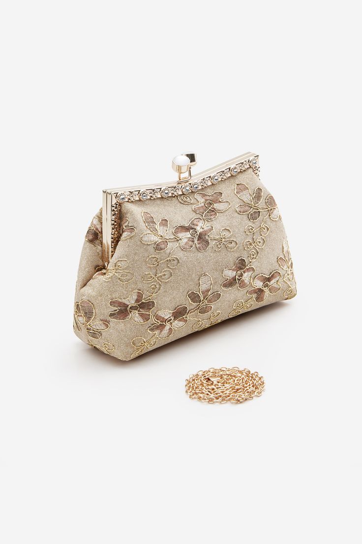 This regal and elegant clutch is completely wrapped in party-ready embellished beads detailing, which sets the stage for a Roaring 20s party. Features: Floral embroidery decoration Kiss lock design Detachable chain strap design 1 inch / 23.12 cm x 5.5 inch / 14 cm ( L x H ) Party Clutch With Pearl Embroidery In Gold, Gold Clutch With Pearl Embroidery For Party, Party Gold Clutch With Pearl Embroidery, Glamorous Clutch With Pearl Embroidery, Gold Evening Bag With Pearl Embroidery For Events, Chic Clutch With Pearl Embroidery For Events, Formal Gold Clutch With Pearl Embroidery, Glamorous Formal Evening Bag With Pearl Embroidery, Embroidered Beige Clutch For Party