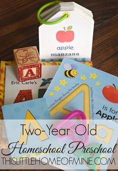 two year old homeschool preschool books stacked on top of each other