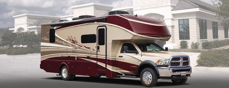 an rv parked in front of a house