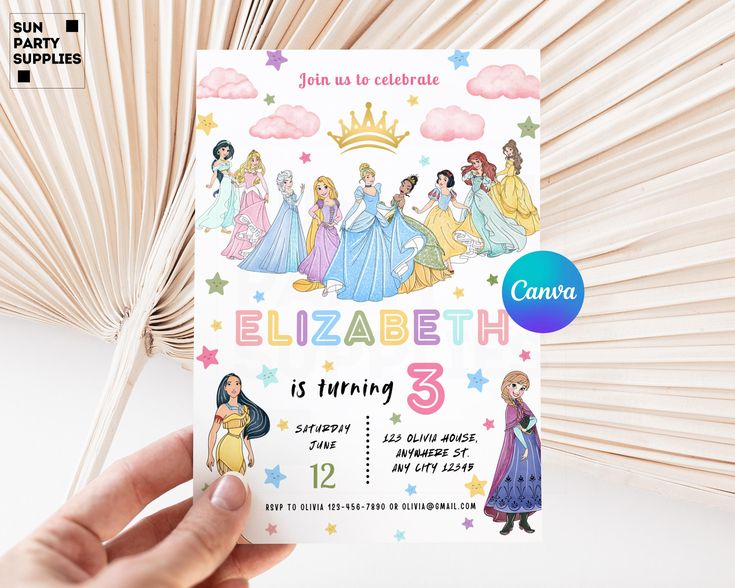 a hand holding up a birthday card with princesses on it and stars in the background