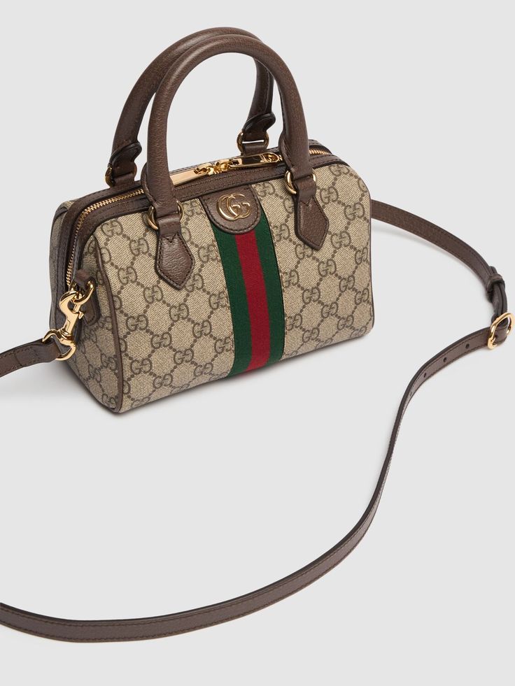 Height: 14cm Width: 21.5cm Depth: 11.5cm. Detachable strap,Drop: 52cm. Double top handles,Drop: 9cm. Top zip closure. Logo details. Chevron quilted front and back. Gold-colored metal hardware. Fabric lining Gucci Crossbody Satchel With Top Carry Handle, Gucci Crossbody Satchel, Everyday Handheld Gucci Satchel, Gucci Satchel With Top Handle And Branded Hardware, Gucci Satchel With Detachable Double Handle, Gucci Crossbody Satchel With Detachable Strap, Gucci Handheld Bag With Detachable Handle, Gucci Handheld Shoulder Bag, Gucci Satchel With Detachable Strap And Double Handle