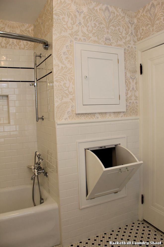 a bathroom with a sink, toilet and bathtub that is missing the door frame