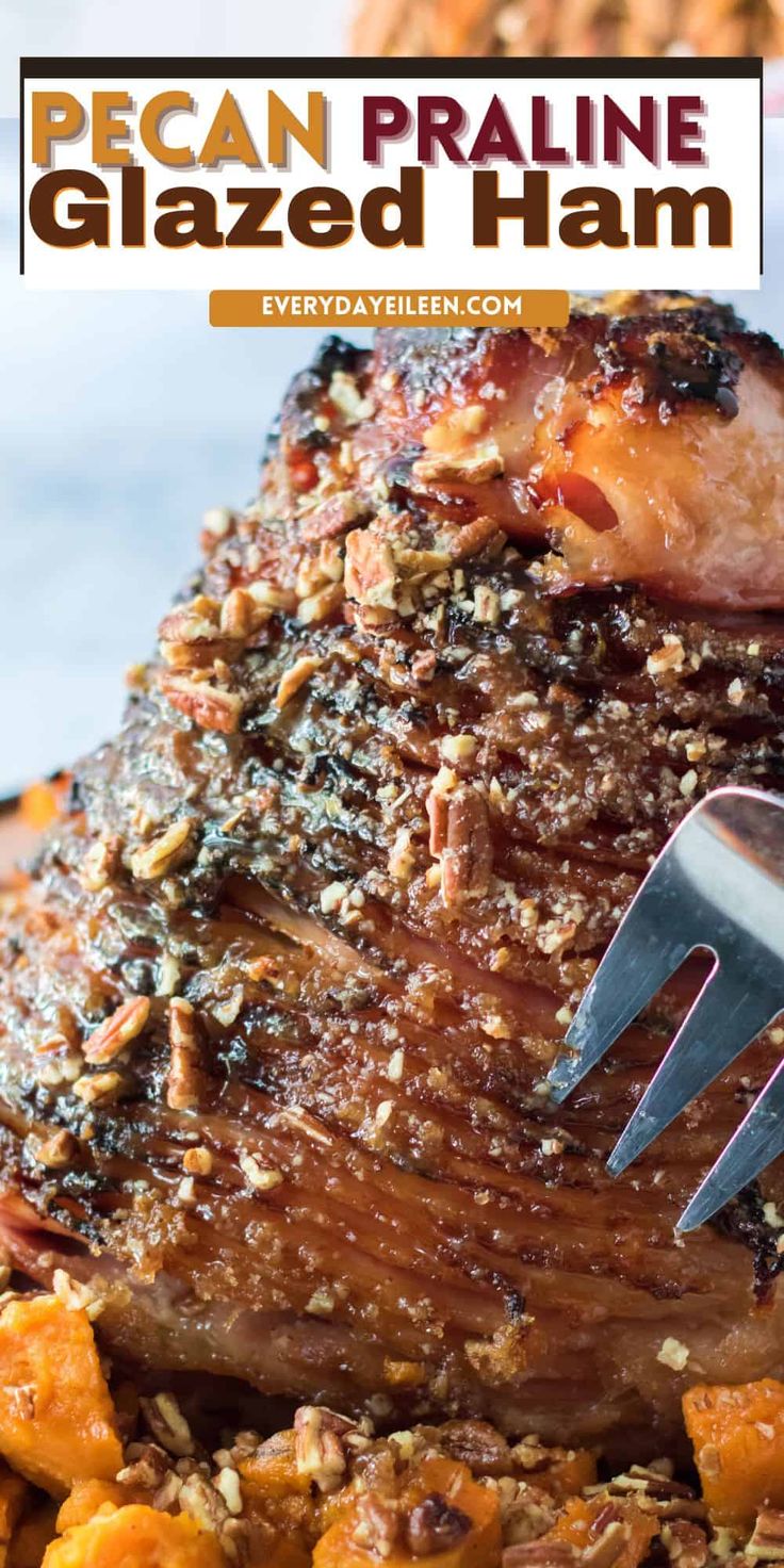 a piece of cooked ham is being held by a fork with the words pecan praline glazed ham on it