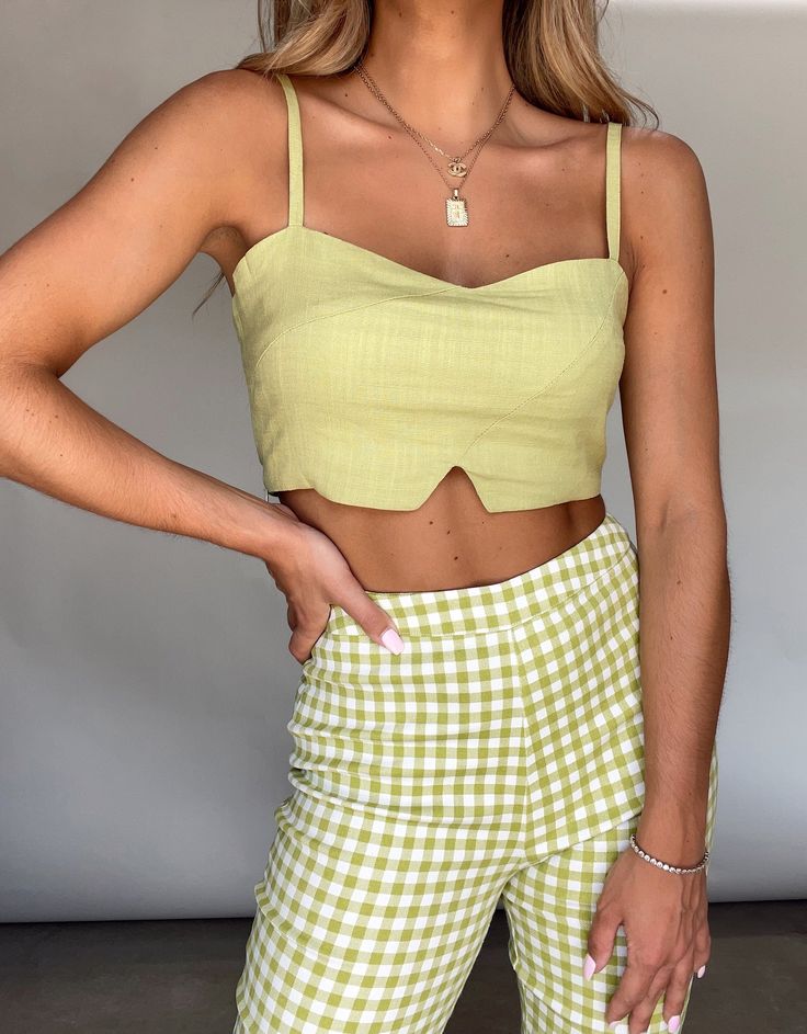 Keep it bright and fun with Lane 201's Reality Called Linen Tank! This tank is so cute and is fun to pair with printed pants or some denim! This top features a cutout and adjustable straps. Perfect to wear for a summer day picnic! Spring Casual Cami Tank Top, Casual Cami Tank Top For Spring, Casual Spring Cami Tank Top, Green Tank Top For Spring, Spring Casual Tank Top With Adjustable Straps, Casual Spring Tank Top With Adjustable Straps, Cute Spring Cotton Tank Top, Cute Spring Tops With Tank Straps, Fun Sleeveless Tank Top For Spring