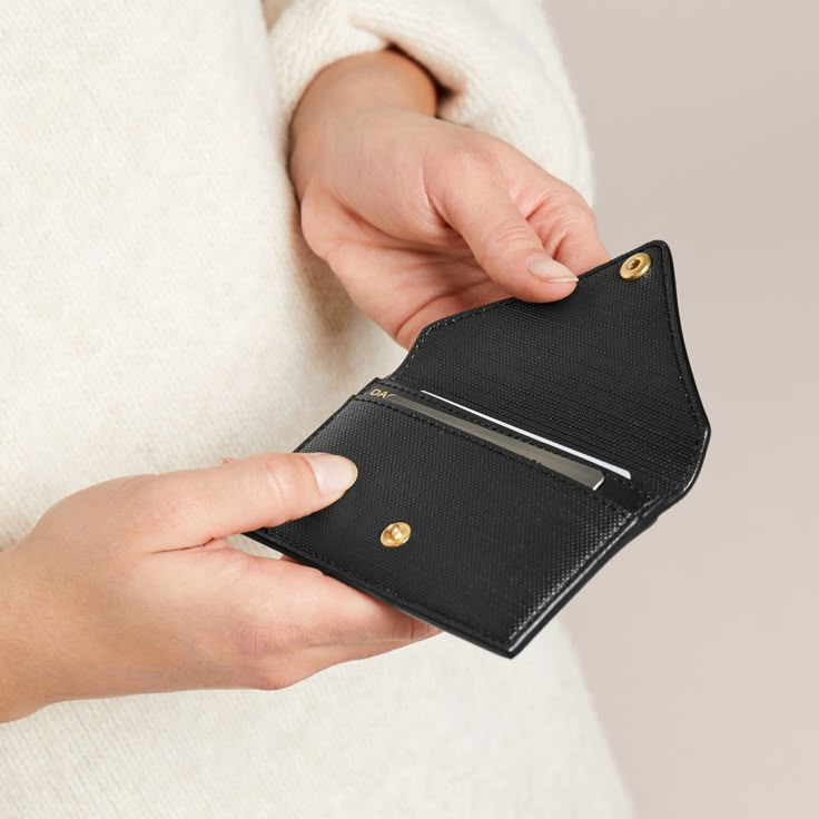 Keep business, bank, metro or other cards safe and snug in our minimalist Card Case in Charcoal Grey. Ideal for events, quick errands or coffee breaks, the sleek accessory keeps currency close at hand or in your pocket. It also fits perfectly inside the Legend, Classic, Midi and Petite totes, so switching between bags is a cinch. Versatile Bifold Card Holder Gift, Versatile Bifold Card Holder As Gift, Modern Rfid Blocking Coin Purse As Gift, Classic Card Holder With Interior Key Chain For Travel, Classic Compact Card Holder For Everyday, Classic Travel Card Holder With Interior Key Chain, Classic Everyday Compact Card Holder, Compact Card Holder With Card Slots For Everyday Use, Compact Card Holder With Card Slots