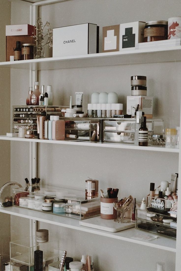 the shelves are filled with cosmetics and beauty products