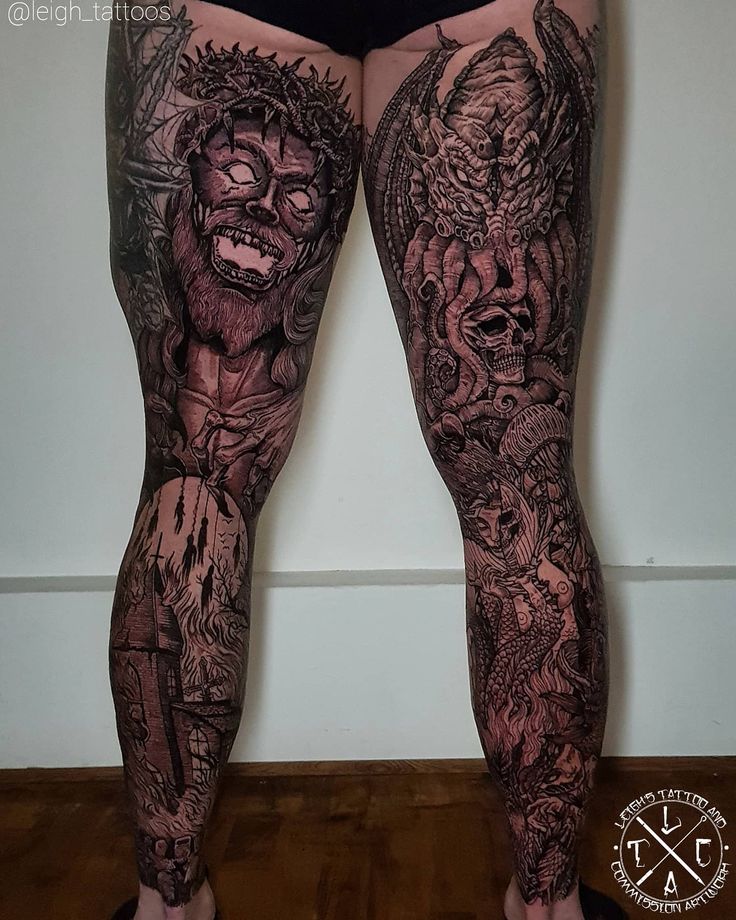 a person with tattoos on their legs