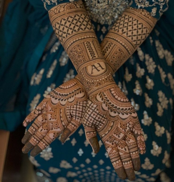 a woman's hands with hennap on it