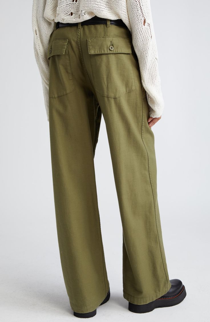 These utility pants are cut in a wide-leg silhouette from Japanese surplus military sateen that's slubbed and treated with an enzyme wash for softness. 32 1/2" inseam; 22" leg opening; 13 1/2" front rise; 17" back rise (size 29) Button fly Front slant pockets; back button-flap patch pockets 100% cotton Machine wash, dry flat Imported SPACE: A shop for emerging and advanced designers Olive Wide Leg Cargo Pants For Work, Olive Wide Leg Relaxed Fit Pants, Casual Olive Wide Leg Pants With Pockets, Olive Straight Leg Pants With Side Pockets, Khaki Wide Leg Relaxed Fit Jeans, Relaxed Fit Linen Cargo Bottoms, Relaxed Fit Linen Cargo Style Bottoms, Utility Wide Leg Pants With Relaxed Fit, Green Washed Wide Leg Bottoms