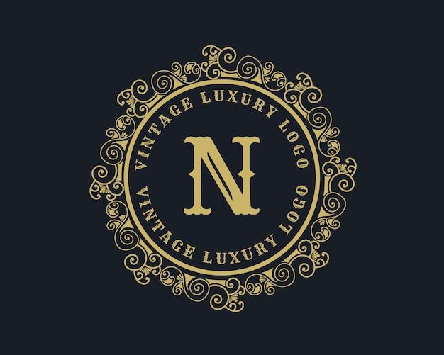 the n logo is shown in gold on a black background with swirls and scrolls