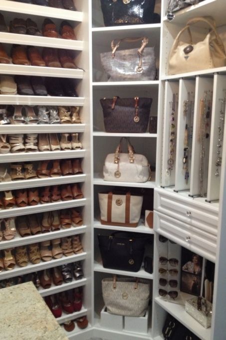 the closet is full of shoes and handbags