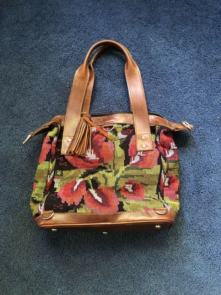 Very gently pre loved, in excellent condition. Looks brand new. No rips, stains, or pulls. Multi wear. Comes with crossbody strap and dust bag. Beautiful and handmade. Full grain leather. 2 side pockets with snap close. 3 removable straps. (H) 13inches (W) 17 inches and (D) 6 inches. Please contact me with additional questions. I am always open to reasonable offers. Crossbody Strap, Kate Spade Top Handle Bag, Full Grain Leather, 6 Inches, Grain, Dust Bag, Top Handle Bag, Leather