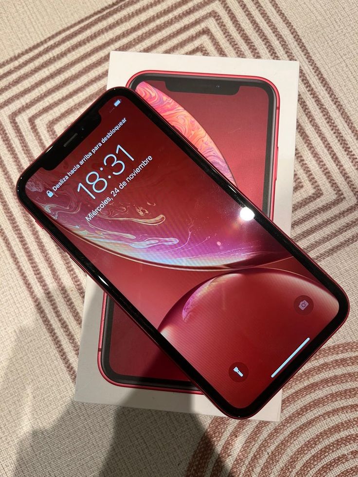 the new iphone xr is in its box and it's still on display