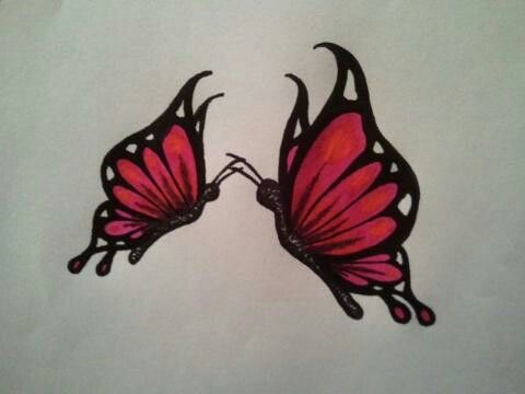 two pink butterflies on white paper with black outline, one is facing the other way