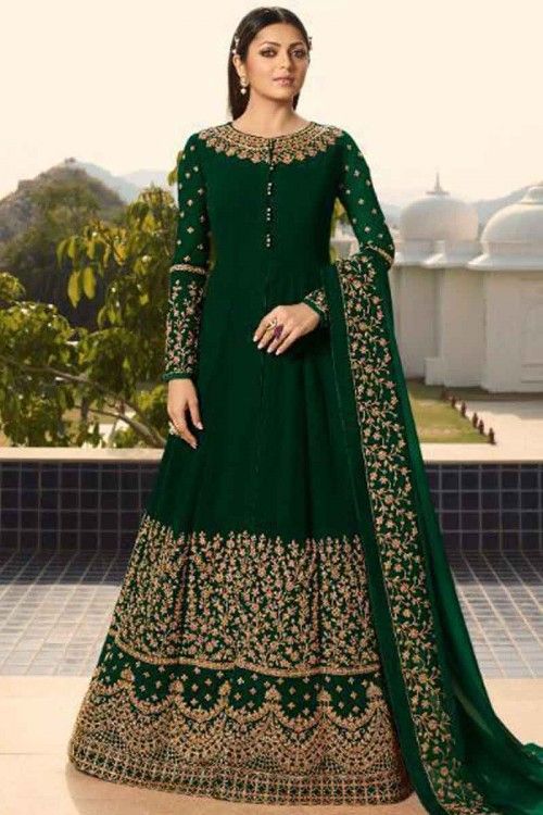 Cast a spell with this Dark Green Georgette Anarkali Suit Which will surely tell them that the diamonds aren't the only beautiful thing which they have seen. This Round neck and Full Sleeve Party Wear Attire highlighted with zari and stone work. Georgette Anarkali Suits, Diwali Dresses, Designer Anarkali Suits, Embroidered Anarkali, Fancy Gowns, Designer Anarkali, Heavy Embroidery, Salwar Kameez Designs, Anarkali Suit